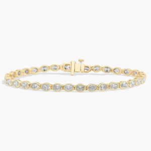 7 " Oval Cut Lab Grown Diamond E/W Bezel Set Tennis Bracelet In 14K Yellow Gold (5 Ct. tw. - F-G / VS2-SI1)